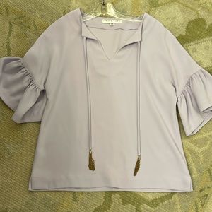 Trina Turk tassel tie purple violet blouse with ruffled sleeves XS